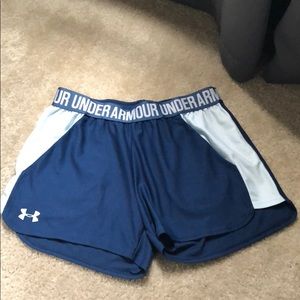 Under Armour running shorts WITH pockets